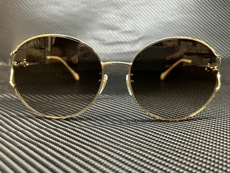 Gucci Women's Gold Round Sunglasses