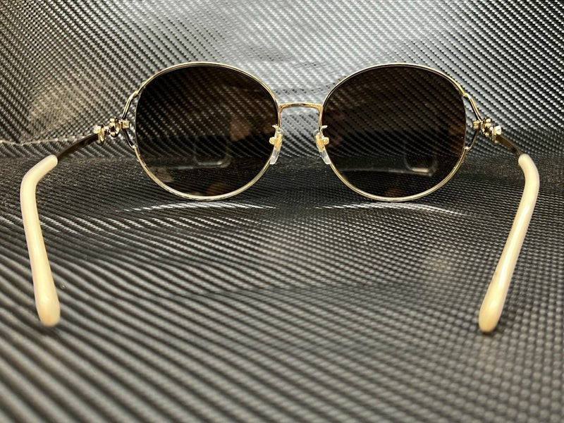 Gucci Women's Gold Round Sunglasses