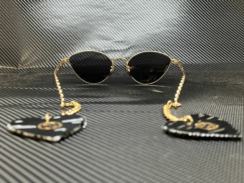 Gucci Women's Gold Cat Eye Sunglasses